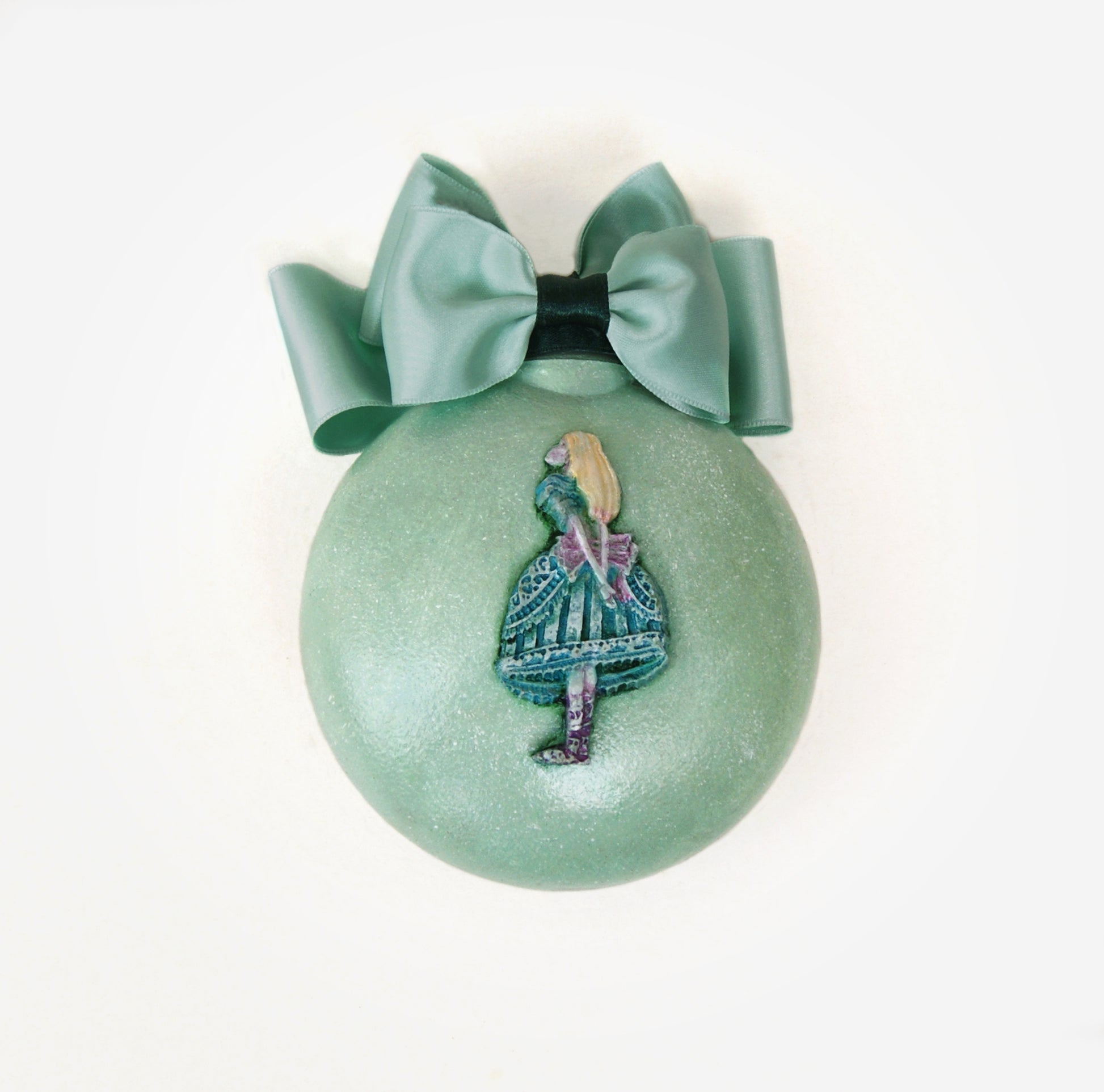 Christmas tree ball in gift box, Alice in Wonderland.
Color Mint green.