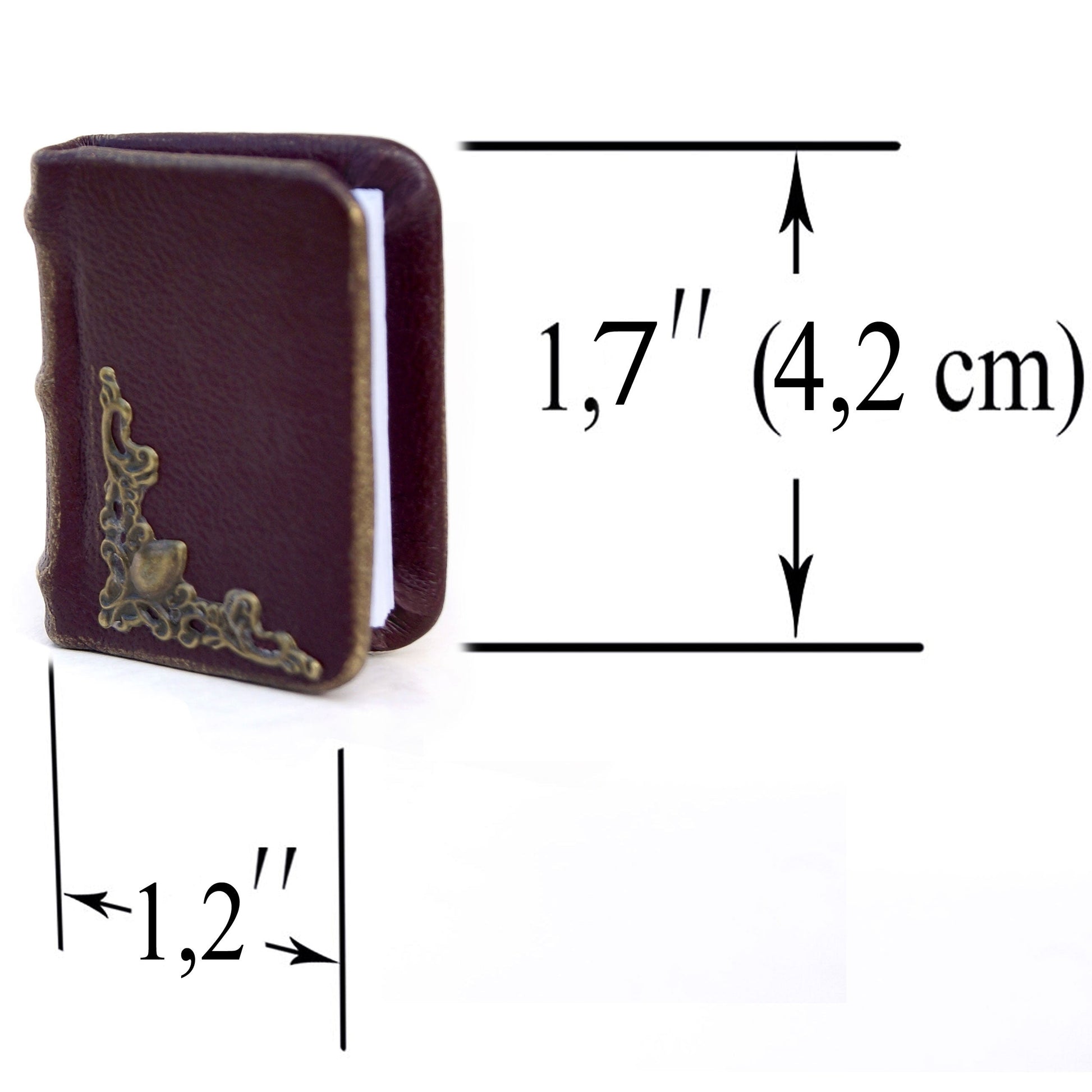 Small brown leather book with measurements on a white background