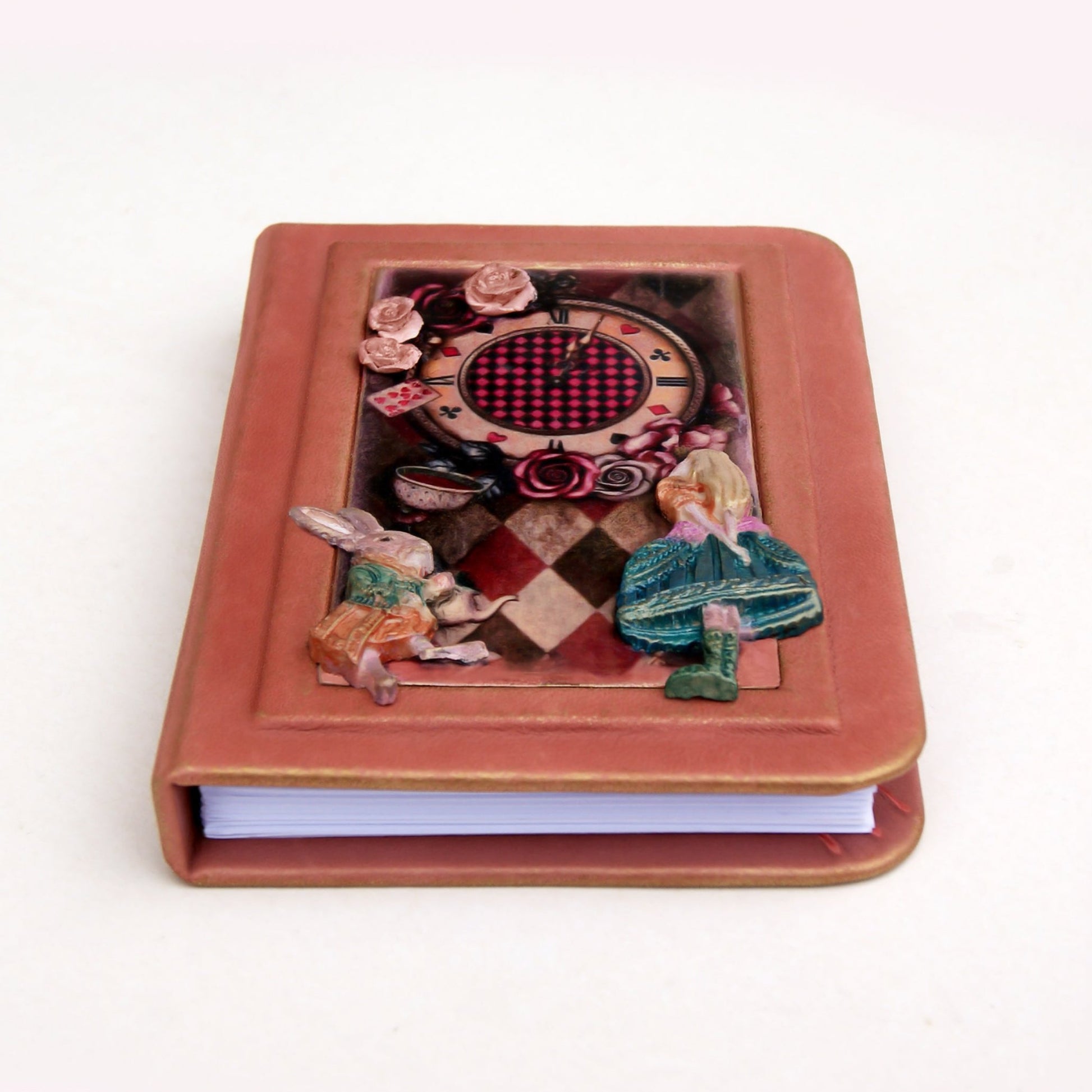 handmade pink leather journal with Alice on the cover