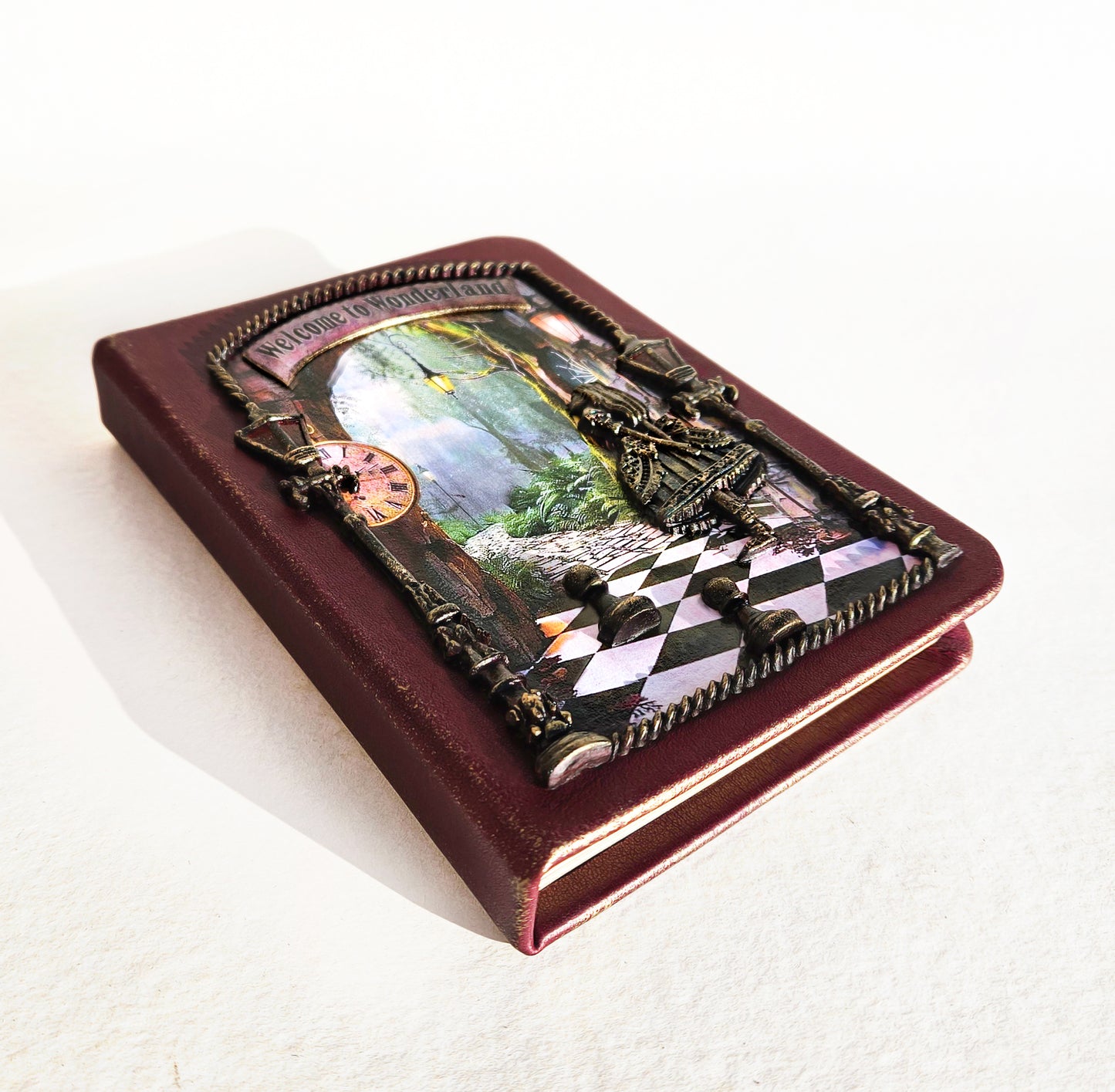 Decorative book with artistic cover on a white background