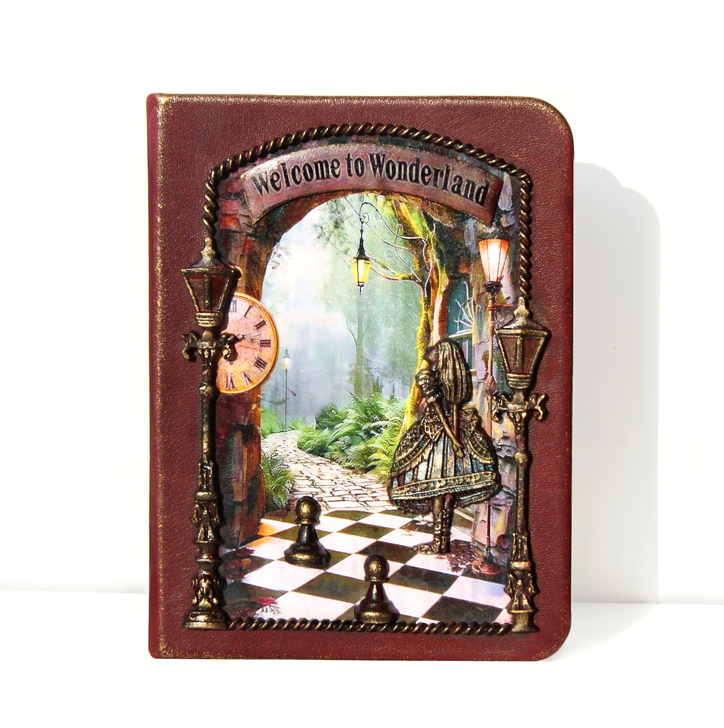 Decorative journal with Wonderland design featuring a checkered floor,Alice, and lanterns.