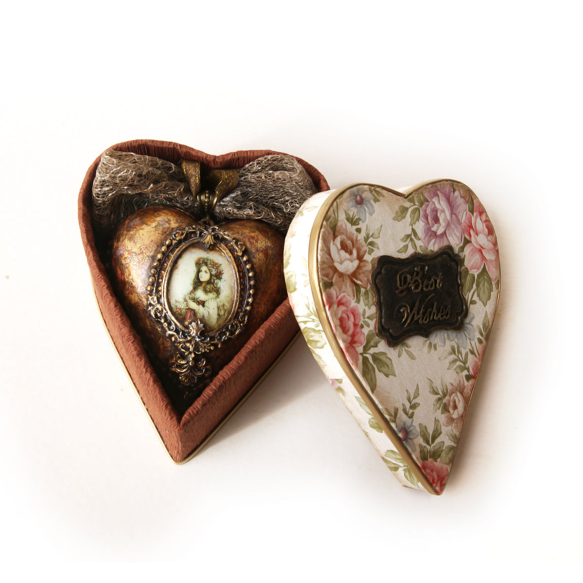 Christmas ball in a heart-shaped gift box