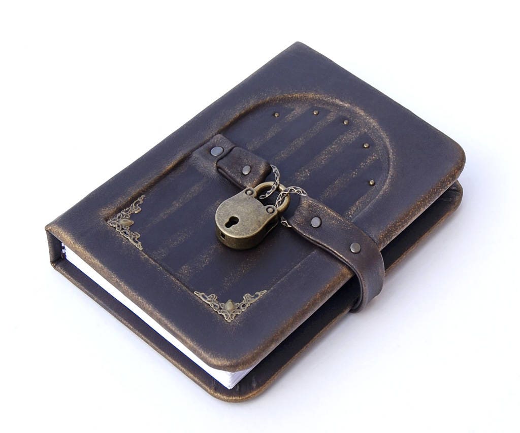 Unique handmade leather bound journal/notebook with real Lock and Key and door on the cover.