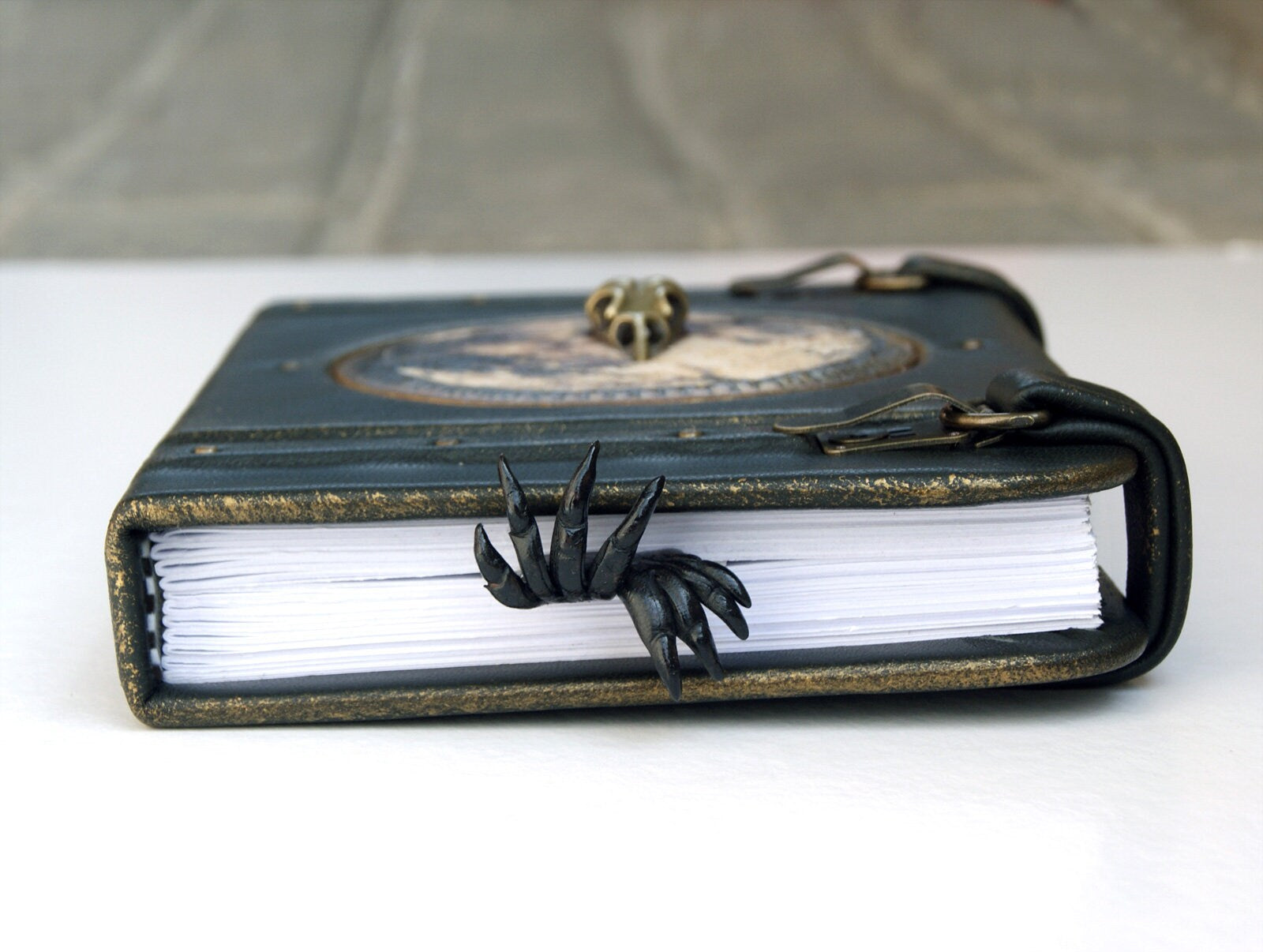  grimoire journal with Raven Skull and bookmark in the form of a paw with claws