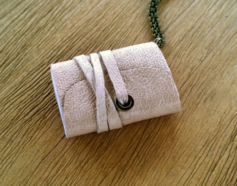 Handmade miniature book necklace.